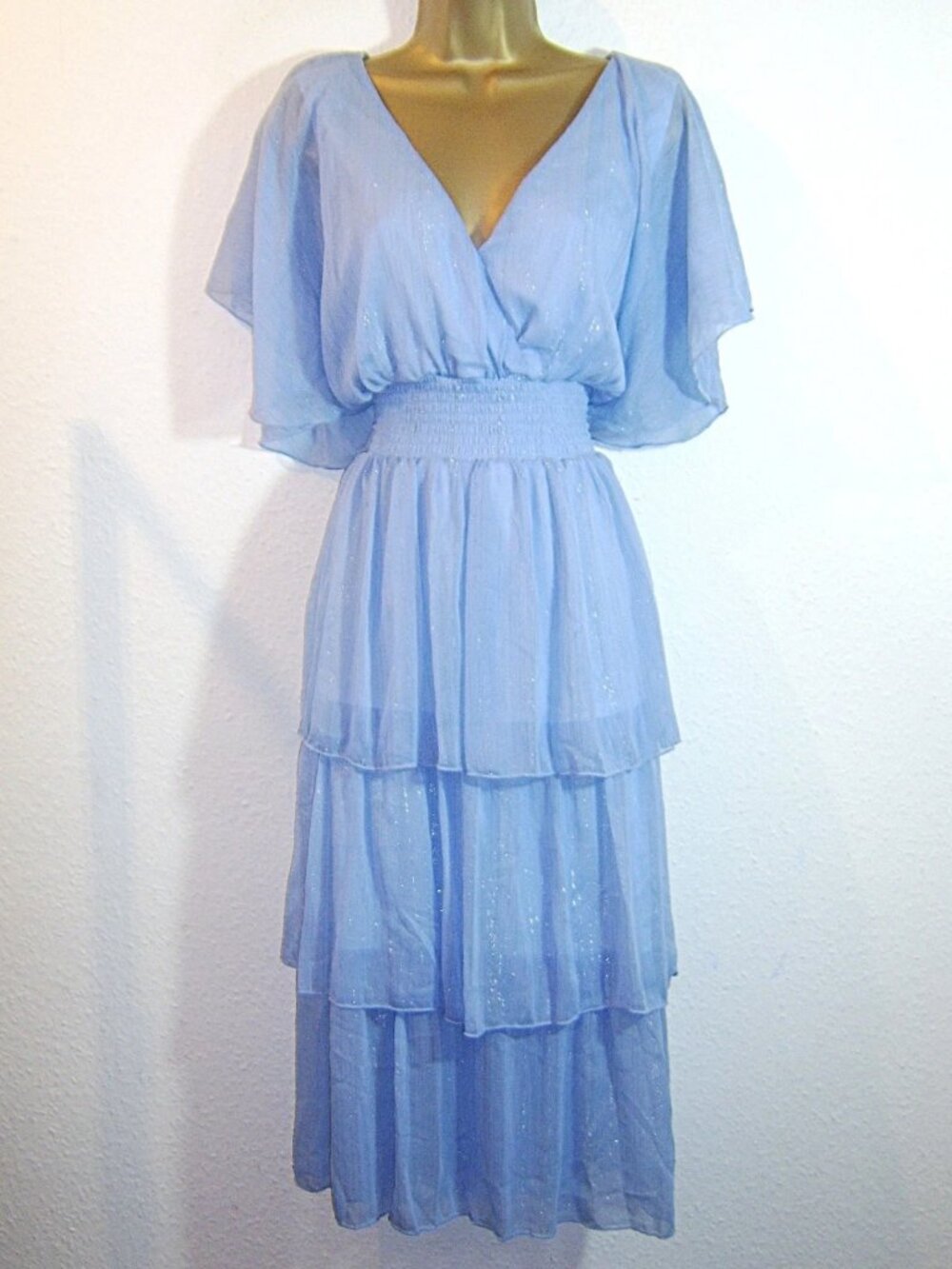 Blue light-colored lustrous gradient-patterned evening dress